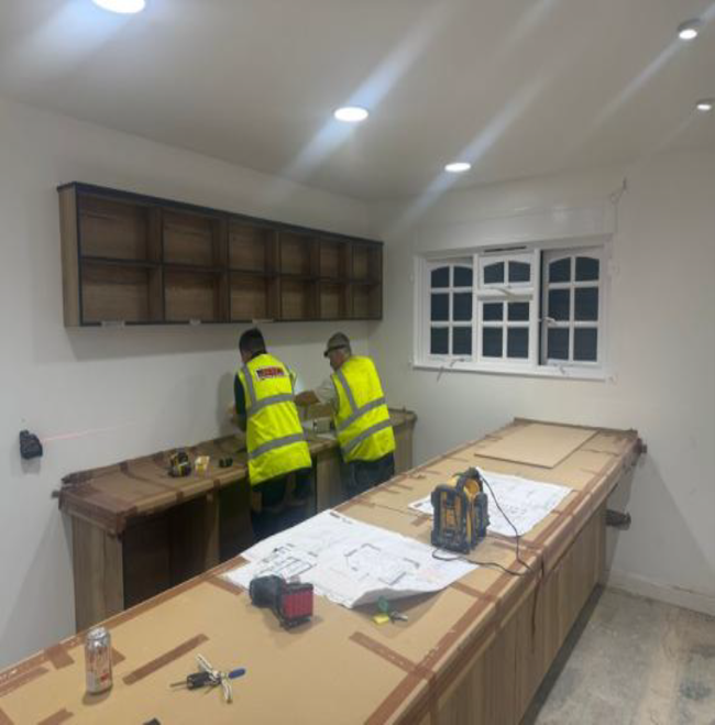Counter and shelves being fitted