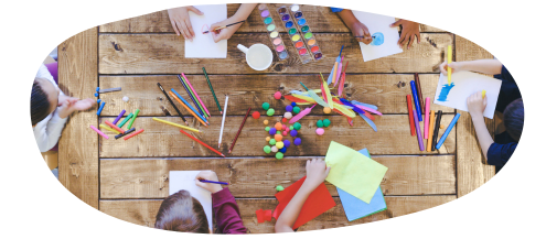 Picture of a table with arts and crafts for children