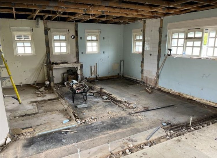 The original building under construction preparing it for refurbishment