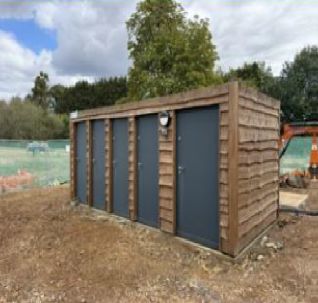Front view of the toilet block on the concrete base