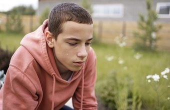 Close up sad boy portrait (freepik)