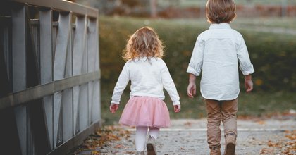 Siblings walking together