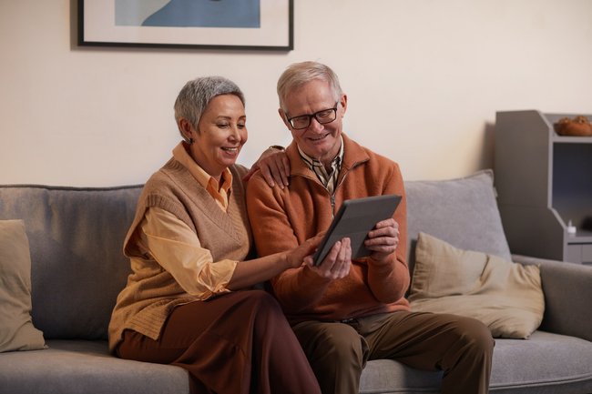 Couple looking at an iPad